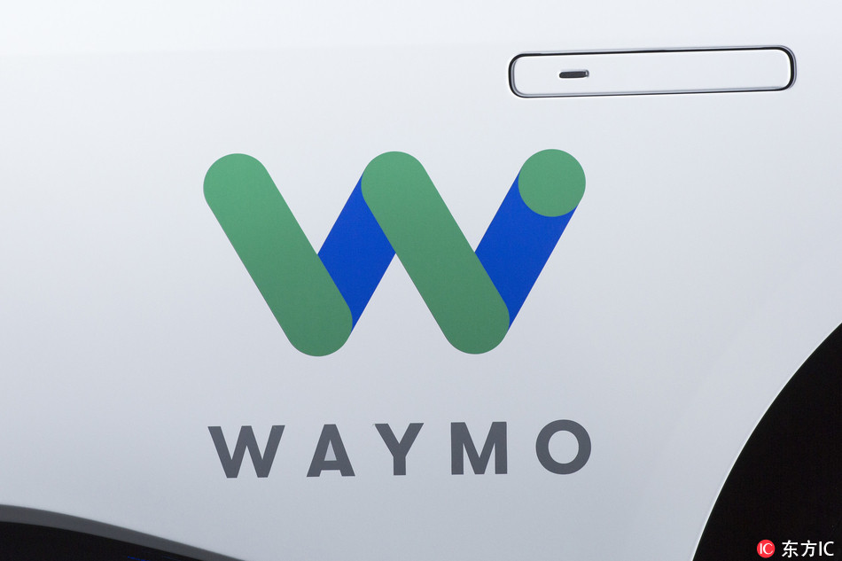 Photo shows the Waymo logo on the of a Jaguar I-Pace vehicle, in New York, March 27, 2018. Google spinoff Waymo and Phoenix's major transit agency are partnering to test self-driving vehicles that would also boost public transportation use. [File photo: IC]