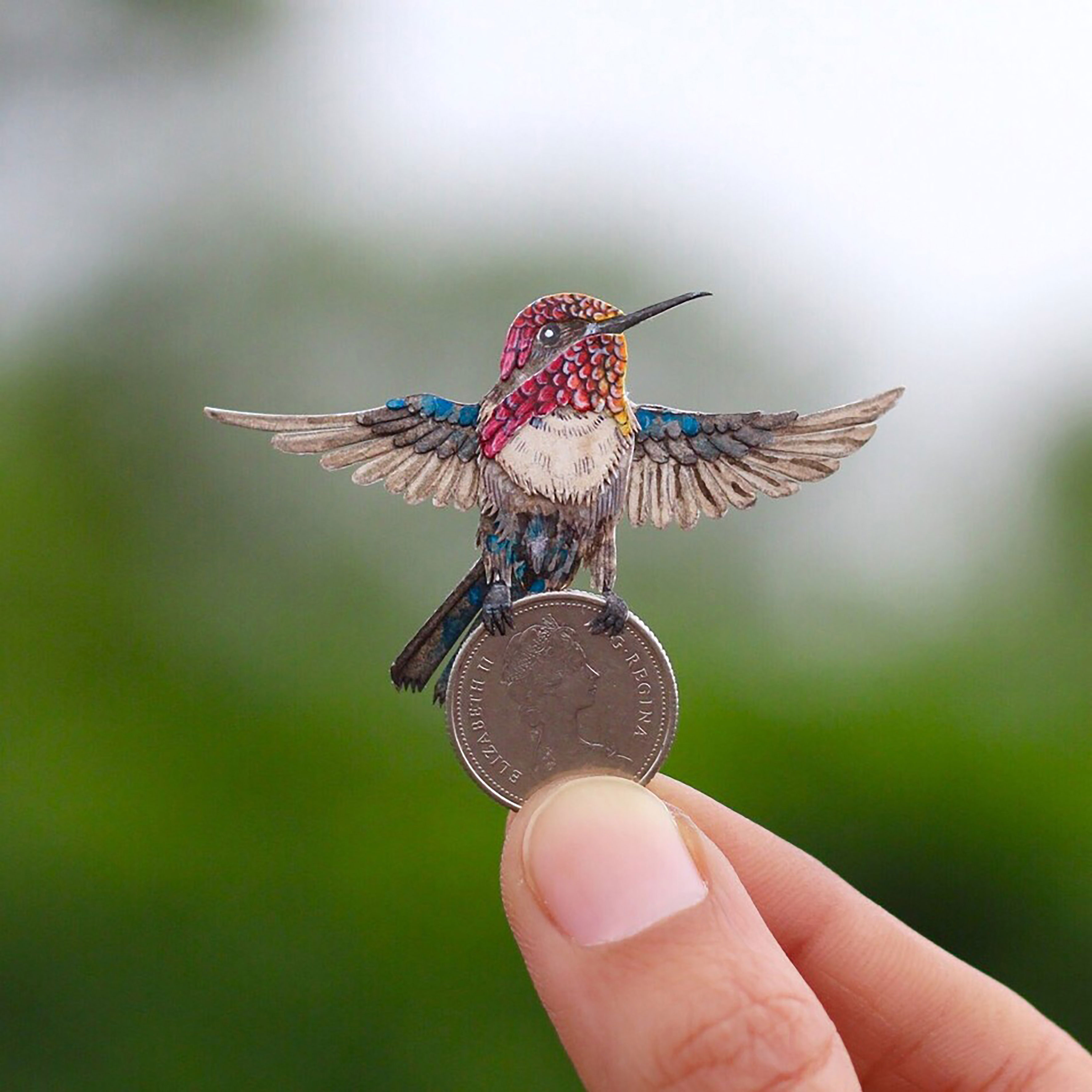 Dedicated couple makes tiny intricate paper birds