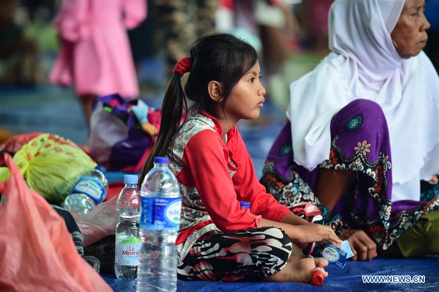 Tsunami survivors rest at temporary shelter in Banten Province, Indonesia