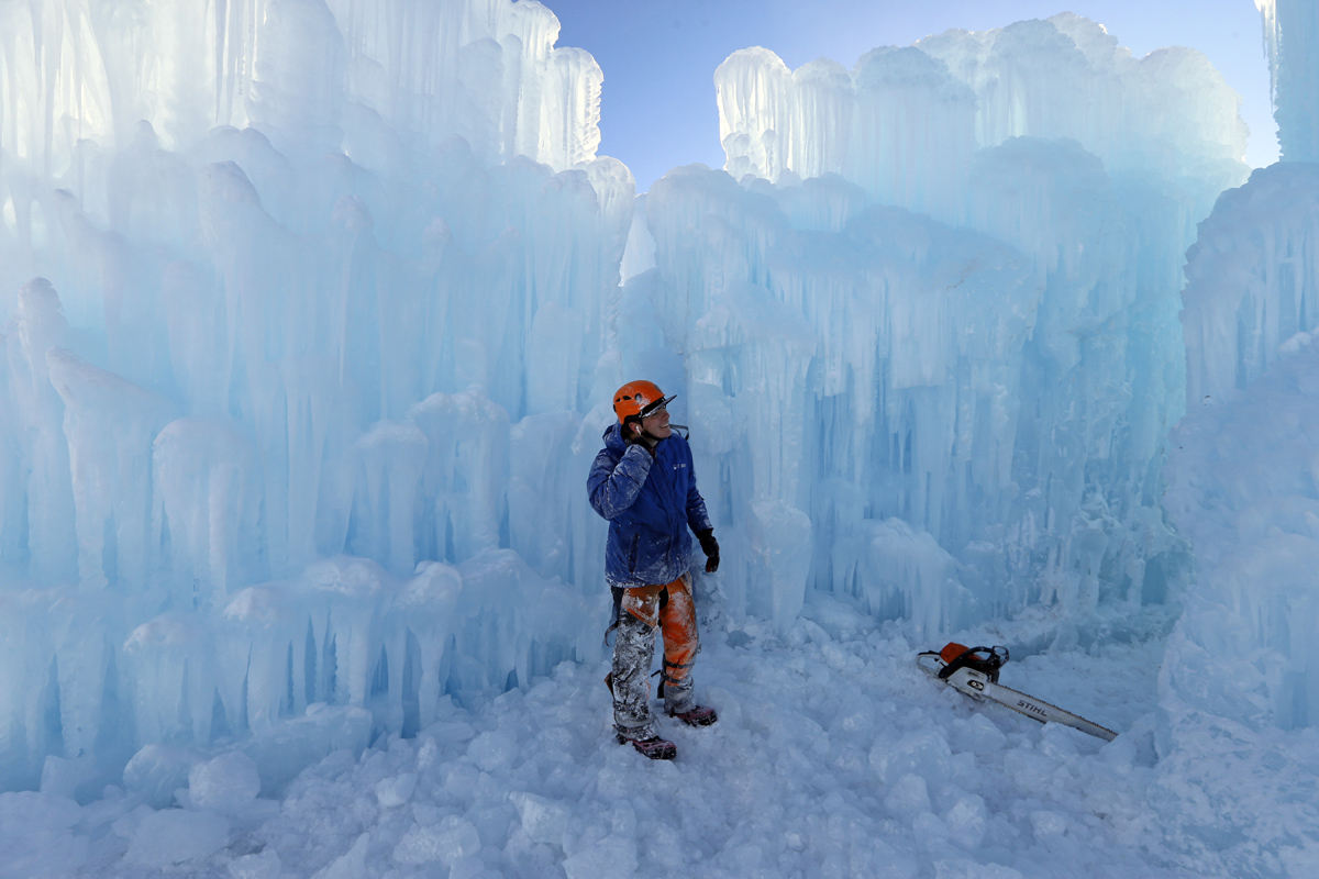 Artisans build ice castles as winter storm hits Utah
