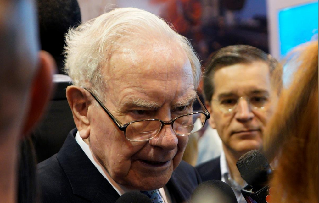 Buffett's Berkshire swings to rare loss but performs better