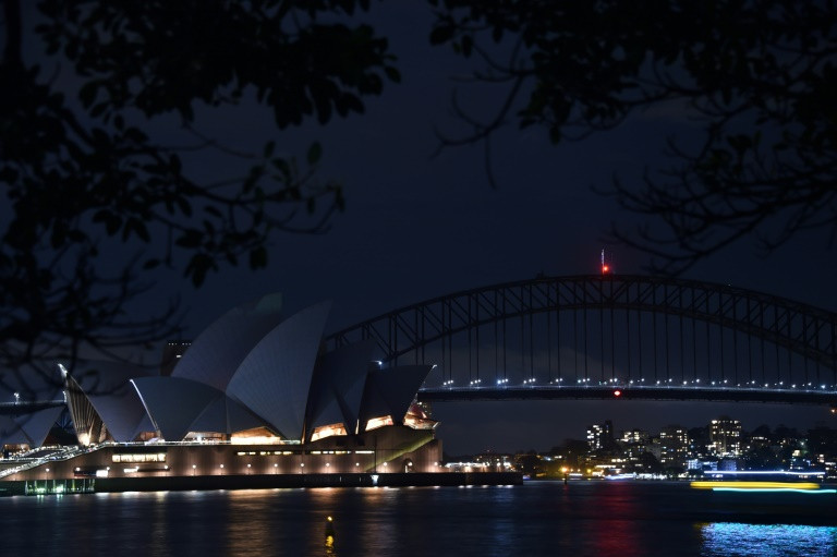 Sydney goes dark as global Earth Hour climate campaign kicks off