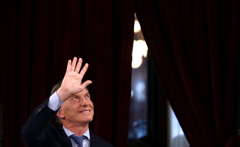 Argentina's Macri calls for labor amnesty, defends gradual approach