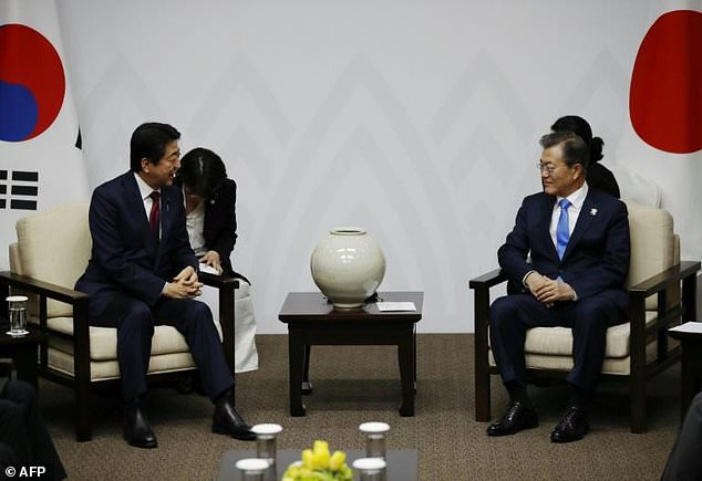 South Korea's Moon says Japan cannot declare wartime crimes 'over'