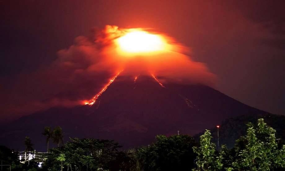 Philippine volcano 'fireworks' draw tourists as residents flee