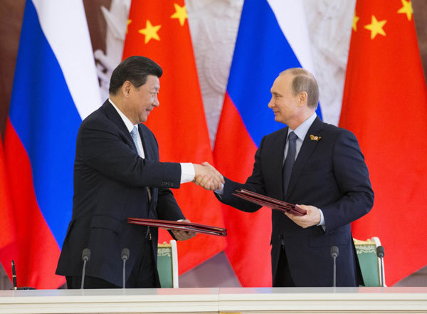 China pledges broader cooperation with Russia in 2018