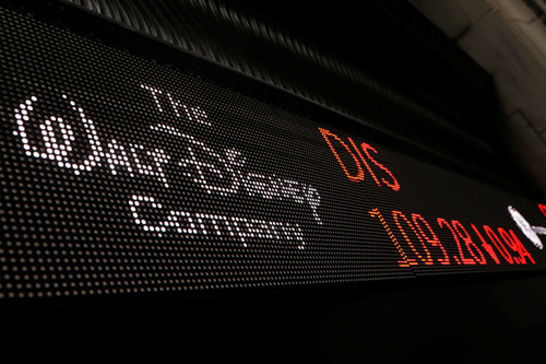 A logo of Walt Disney company is displayed on a monitor outside of the New York Stock Exchange shortly after the opening bell in New York, U.S., December 5, 2017. REUTERS Lucas Jackson_副本.jpg