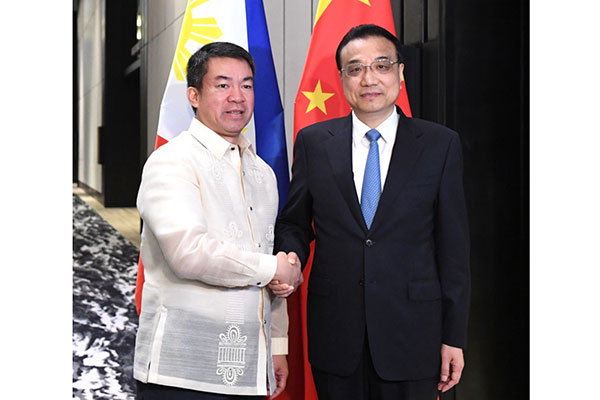 China, Philippines sign 14 deals, vow to boost ties